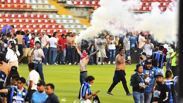 El caos y la violencia reino esta tarde en el Estadio Corregidora.