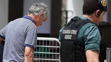 Spain's football federation (RFEF) president Angel Maria Villar is led by Spanish Civil Guards during a raid at the Spanish Soccer Federation headquarters in Las Rozas, outside Madrid, Spain, July 18, 2017. REUTERS/Juan Medina