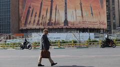 An anti-Israel billboard with a picture of Iranian missiles is seen in a street in Tehran, Iran April 15, 2024. Majid Asgaripour/WANA (West Asia News Agency) via REUTERS ATTENTION EDITORS - THIS IMAGE HAS BEEN SUPPLIED BY A THIRD PARTY.