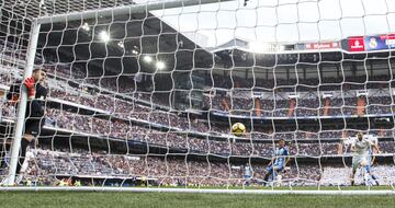 ...and Benzema snaffles up the loose ball to put Real Madrid 1-0 up.