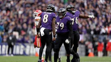 BALTIMORE, MARYLAND - JANUARY 28: Lamar Jackson #8 of the Baltimore Ravens celebrates with teammates after throwing a touchdown pass against the Kansas City Chiefs during the first quarter in the AFC Championship Game at M&T Bank Stadium on January 28, 2024 in Baltimore, Maryland.   Patrick Smith/Getty Images/AFP (Photo by Patrick Smith / GETTY IMAGES NORTH AMERICA / Getty Images via AFP)