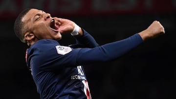 Paris Saint-Germain&#039;s French forward Kylian Mbappe celebrates after scoring a goal during the French L1 football match between Paris Saint-Germain (PSG) and Dijon, on February 29, 2020 at the Parc des Princes stadium in Paris. (Photo by FRANCK FIFE /