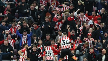 Soccer Football - Premier League - Sunderland v Newcastle United - Stadium of Light, Sunderland, Britain - December 14, 2025 Sunderland players celebrate their first goal, an own goal scored by Newcastle United's Nick Woltemade REUTERS/Scott Heppell EDITORIAL USE ONLY. NO USE WITH UNAUTHORIZED AUDIO, VIDEO, DATA, FIXTURE LISTS, CLUB/LEAGUE LOGOS OR 'LIVE' SERVICES. ONLINE IN-MATCH USE LIMITED TO 120 IMAGES, NO VIDEO EMULATION. NO USE IN BETTING, GAMES OR SINGLE CLUB/LEAGUE/PLAYER PUBLICATIONS. PLEASE CONTACT YOUR ACCOUNT REPRESENTATIVE FOR FURTHER DETAILS..