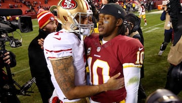 San Francisco 49ers QB Colin Kaepernick (7) and Washington Redskins QB Robert Griffin III greet after a game at FedExField, Landover, MD, on Monday, Nov. 25, 2013.