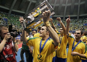 Falcao of Brazil holds their trophy after winning the FIFA Futsal World Cup soccer match against Spain at the Gimnasio Maracanazinho in Rio de Janeiro October 19, 2008. REUTERS/Bruno Domingos (BRAZIL)