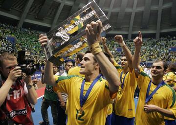 Falcao of Brazil holds their trophy after winning the FIFA Futsal World Cup soccer match against Spain at the Gimnasio Maracanazinho in Rio de Janeiro October 19, 2008. REUTERS/Bruno Domingos (BRAZIL)