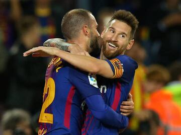 Messi celebrates with Aleix Vidal after Barcelona's sixth.