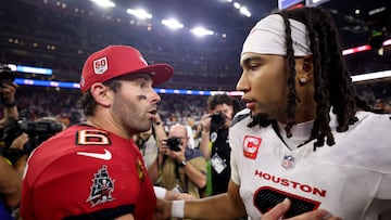 HOUSTON, TEXAS - SEPTEMBER 15: C.J. Stroud #7 of the Houston Texans congratulates Baker Mayfield #6 of the Tampa Bay Buccaneers after the game at NRG Stadium on September 15, 2025 in Houston, Texas. Tim Warner/Getty Images/AFP (Photo by Tim Warner / GETTY IMAGES NORTH AMERICA / Getty Images via AFP)