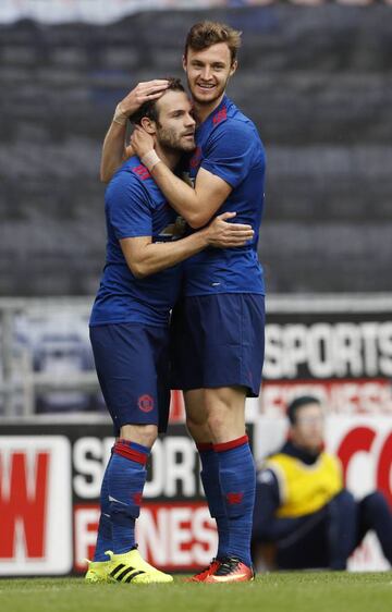 United's Will Keane celebrates scoring their first goal after being laid on a plate by Juan Mata.