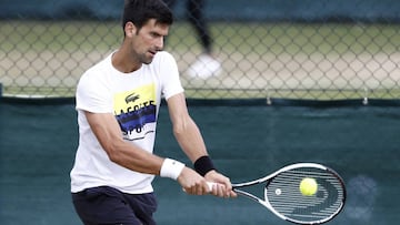 Novak Djokovic of Serbia, attends  a training session at the All England Lawn Tennis Championships in Wimbledon, London, Monday, July 3, 2017. (Peter Klaunzer/Keystone via AP)