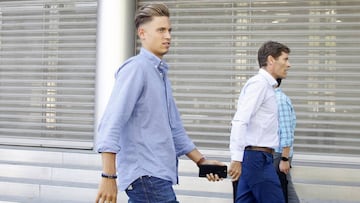 Marcos Llorente, junto a Julio Llorente.