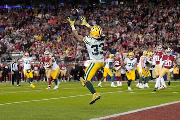 Aaron Jones #33 of the Green Bay Packers catches a two point conversion 