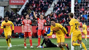 Barcelona's Spanish midfielder Pedri (2R) celebrates scoring the opening goal during the Spanish League football match between Girona FC and FC Barcelona at the Montilivi stadium in Girona on January 28, 2023. (Photo by Pau BARRENA / AFP) (Photo by PAU BARRENA/AFP via Getty Images)