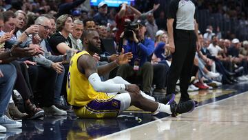 DENVER, COLORADO - MAY 18: LeBron James #6 of the Los Angeles Lakers reacts after being knocked to the floor during the fourth quarter against the Denver Nuggets in game two of the Western Conference Finals at Ball Arena on May 18, 2023 in Denver, Colorado. NOTE TO USER: User expressly acknowledges and agrees that, by downloading and or using this photograph, User is consenting to the terms and conditions of the Getty Images License Agreement.   Matthew Stockman/Getty Images/AFP (Photo by MATTHEW STOCKMAN / GETTY IMAGES NORTH AMERICA / Getty Images via AFP)