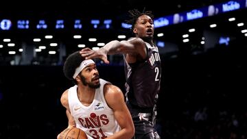 NEW YORK, NEW YORK - DECEMBER 16: Jarrett Allen #31 of the Cleveland Cavaliers looks to shoot as Dorian Finney-Smith #28 of the Brooklyn Nets defends during the first quarter at Barclays Center on December 16, 2024 in the Brooklyn borough of New York City. NOTE TO USER: User expressly acknowledges and agrees that, by downloading and or using this photograph, User is consenting to the terms and conditions of the Getty Images License Agreement. Luke Hales/Getty Images/AFP (Photo by Luke Hales / GETTY IMAGES NORTH AMERICA / Getty Images via AFP)