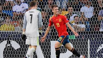 Soccer Football - 2019 UEFA European Under-21 Championship - Final - Spain v Germany - Dacia Arena, Udine, Italy - June 30, 2019  Spain&#039;s Dani Olmo celebrates scoring their second goal as Germany&#039;s Alexander Nubel looks dejected   REUTERS/Albert