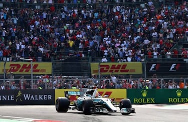 Hamilton secures fourth title despite early collision