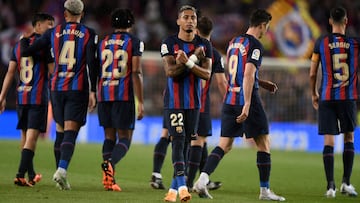 Barcelona's Brazilian forward Raphinha celebrates scoring his team's third goal during the Spanish league football match between FC Barcelona and Real Betis at the Camp Nou stadium in Barcelona on April 29, 2023. (Photo by Josep LAGO / AFP)