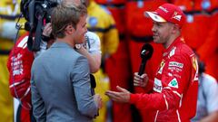 MONTE-CARLO, MONACO - MAY 28: Sebastian Vettel of Germany and Ferrari talks with 2016 F1 World Drivers Champion Nico Rosberg during the Monaco Formula One Grand Prix at Circuit de Monaco on May 28, 2017 in Monte-Carlo, Monaco.  (Photo by Dan Istitene/Getty Images)