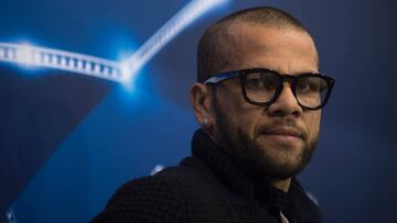 Juventus' Brazilian defender Dani Alves looks on before a press conference at the Sanchez Pizjuan's stadium in Sevilla on November 21, 2016 on the eve of the UEFA Champions League football match Sevilla FC vs Juventus.