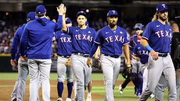 PHOENIX, ARIZONA - OCTOBER 30: The Texas Rangers celebrate after beating the Arizona Diamondbacks 3-1 in Game Three of the World Series at Chase Field on October 30, 2023 in Phoenix, Arizona.   Christian Petersen/Getty Images/AFP (Photo by Christian Petersen / GETTY IMAGES NORTH AMERICA / Getty Images via AFP)