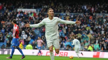 MADRID, SPAIN - NOVEMBER 26:  Cristiano Ronaldo of Real Madrid celebrates after scoring Real&#039;s 2nd goal from during the La Liga match between Real Madrid CF and Real Sporting de Gijon at Estadio Santiago Bernabeu on November 26, 2016 in Madrid, Spain.  (Photo by Denis Doyle/Getty Images)