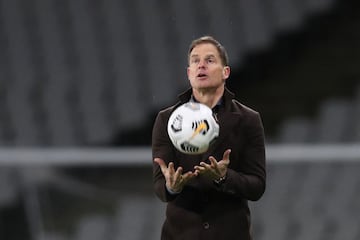 Netherlands' coach Frank de Boer catches the ball during the FIFA World Cup Qatar 2022 qualification Group G football match between Turkey and The Netherlands at the Ataturk Olympic Stadium, in Istanbul, on March 24, 2021. (Photo by TOLGA BOZOGLU / POOL /