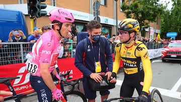 Thomas y Roglic, algo magullado, en la meta de Tortona.