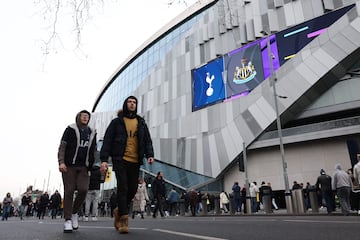 Fans arrive for the English Premier League football match between Tottenham Hotspur and Newcastle United at the Tottenham Hotspur Stadium 