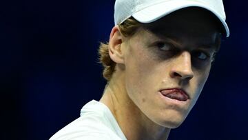 (FILES) Italy's Jannik Sinner reacts during the semi-final match against Russia's Daniil Medvedev at the ATP Finals tennis tournament in Turin on November 18, 2023. Jannik Sinner has accepted on February 15, 2025 a three-month ban from tennis after the world number one admitted team mistakes led to him twice testing positive for traces of banned substance clostebol in March last year. (Photo by Tiziana FABI / AFP)