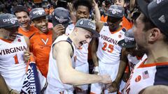 NEW YORK, NY - MARCH 10: Tournament MVP Kyle Guy #5 of the Virginia Cavaliers celebrates with teammates after defeating the North Carolina Tar Heels 71-63 during the championship game of the 2018 ACC Men&#039;s Basketball Tournament at Barclays Center on March 10, 2018 in the Brooklyn borough of New York City.   Abbie Parr/Getty Images/AFP
 == FOR NEWSPAPERS, INTERNET, TELCOS &amp; TELEVISION USE ONLY ==