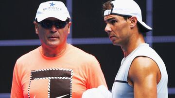 MELBOURNE, AUSTRALIA - JANUARY 11:  Raphael Nadal of Spain walks in front of  coach Tony Nadal during a practice session ahead of the 2017 Australian Open at Melbourne Park on January 11, 2017 in Melbourne, Australia.  (Photo by Michael Dodge/Getty Images)