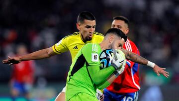 Colombia's goalkeeper Camilo Vargas grabs the ball during the 2026 FIFA World Cup South American qualifiers football match between Chile and Colombia, at the David Arellano Monumental stadium, in Santiago, on September 12, 2023. (Photo by Javier TORRES / AFP)