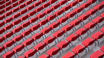 Empty seats are seen at the BayArena stadium during the German first division Bundesliga football match between Bayer 04 Leverkusen and VfB Stuttgart in Leverkusen, western Germany, on February 6, 2021. (Photo by Marius Becker / POOL / AFP) / DFL REGULATI