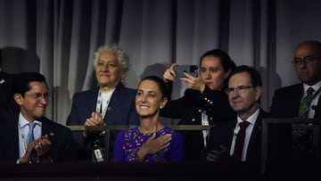 Mexico's President Claudia Sheinbaum reacts during the draw for the 2026 FIFA Football World Cup taking place in the US, Canada and Mexico, at the Kennedy Center, in Washington, DC, on December 5, 2025. (Photo by Dan Mullan / POOL / AFP)