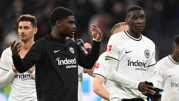 31 March 2023, Hesse, Frankfurt/Main: Soccer: Bundesliga, Eintracht Frankfurt - VfL Bochum, Matchday 26, Deutsche Bank Park. Frankfurt's Lucas Alario (l-r), Eric Junior Dina Ebimbe and Randal Kolo Muani stand together after the match. Photo: Arne Dedert/dpa - IMPORTANT NOTE: In accordance with the requirements of the DFL Deutsche Fußball Liga and the DFB Deutscher Fußball-Bund, it is prohibited to use or have used photographs taken in the stadium and/or of the match in the form of sequence pictures and/or video-like photo series. (Photo by Arne Dedert/picture alliance via Getty Images)