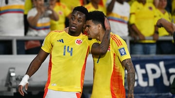 Colombia's forward #14 Jhon Durán celebrates with teammate Colombia's forward #07 Luis Diaz after scoring during the 2026 FIFA World Cup South American qualifiers football match between Colombia and Paraguay at the Metropolitano Roberto Melendez stadium in Barranquilla, Colombia, on March 25, 2025. (Photo by Luis ACOSTA / AFP) (Photo by LUIS ACOSTA/AFP via Getty Images)