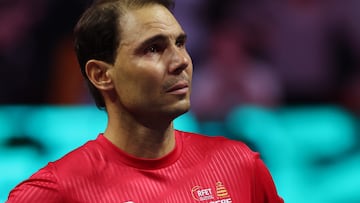 Spain's Rafael Nadal cries as he attends a tribute to his career at the end of the quarter-final doubles match between Netherlands and Spain during the Davis Cup Finals at the Palacio de Deportes Jose Maria Martin Carpena arena in Malaga, southern Spain, on November 19, 2024. Superstar Rafael Nadal's glittering career in professional tennis came to an end on November 19, 2024 as Netherlands eliminated Spain in the Davis Cup quarter-finals. (Photo by Thomas COEX / AFP)