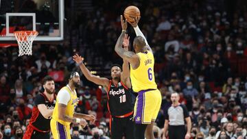 Feb 9, 2022; Portland, Oregon, USA; Los Angeles Lakers forward LeBron James (6) shoots over Portland Trail Blazers guard Dennis Smith Jr. (10) in the second half at Moda Center. Mandatory Credit: Jaime Valdez-USA TODAY Sports