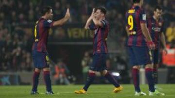 Xavi y Messi, en un partido del Barça.