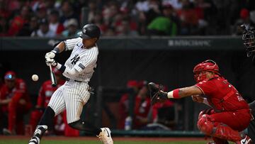 New York Yankees' infielder Oswaldo Cabrera (L) swings and misses the ball next to Mexico Los Diablos Rojos' catcher Jose Briceno (R) during the international friendly baseball game between the New York's Yankees and Mexico's Los Diablos Rojos at the Alfredo Harp Helu stadium in Mexico City on March 25, 2024. (Photo by Yuri CORTEZ / AFP)