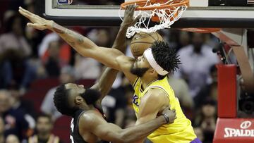 Houston Rockets' James Harden (13) dunks the ball as Los Angeles Lakers' JaVale McGee defends during the first half of an NBA basketball game Thursday, Dec. 13, 2018, in Houston. (AP Photo/David J. Phillip)