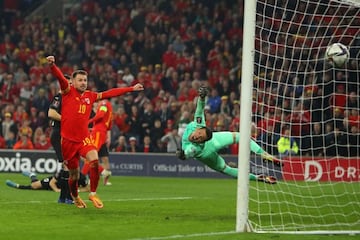 Bale (out of shot) grabs his second of the night against Austria in Cardiff.