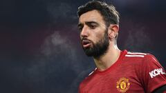 MANCHESTER, ENGLAND - JANUARY 06: Bruno Fernandes of Manchester United looks on during the Carabao Cup Semi Final match between Manchester United and Manchester City at Old Trafford on January 06, 2021 in Manchester, England. The match will be played with