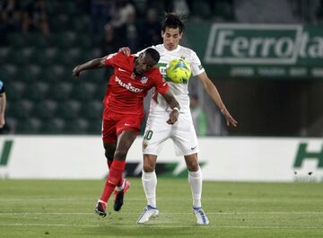 Geoffrey Kondogbia y Pere Milla.