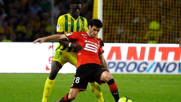Rennes&#039; French midfielder Yoann Gourcuff (R) vies with Nantes&#039; French midfielder Abdoulaye Toure during the French L1 football match Nantes against Rennes on April 20, 2018 at the La Beaujoire stadium in Nantes, western France.   / AFP PHOTO / D