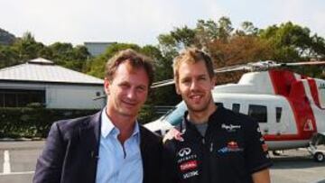 <b>JUNTOS Y FELICES. </b>Christian Horner, jefe de Red Bull, y Sebastian Vettel, ayer en Japón, donde debían cumplir con actos promocionales.