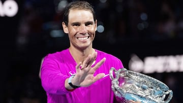 Rafael Nadal from Spain celebrates winning with he trophy his Men&#039;s Singles Finals match against Daniil Medvedev from Russia at the 2022 Australian Open, Grand Slam tennis tournament on January 30, 2022 at Melbourne Park in Melbourne, Australia - Pho