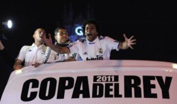 With the Madrid squad celebrating the 2011 Copa del Rey win.