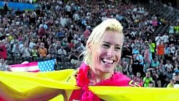 <b>CAMPEONA. </b>Marta Domínguez sonríe tras conquistar su primer título de campeona mundial de 3.000 metros obstáculos en el Estadio Olímpico de Berlín.